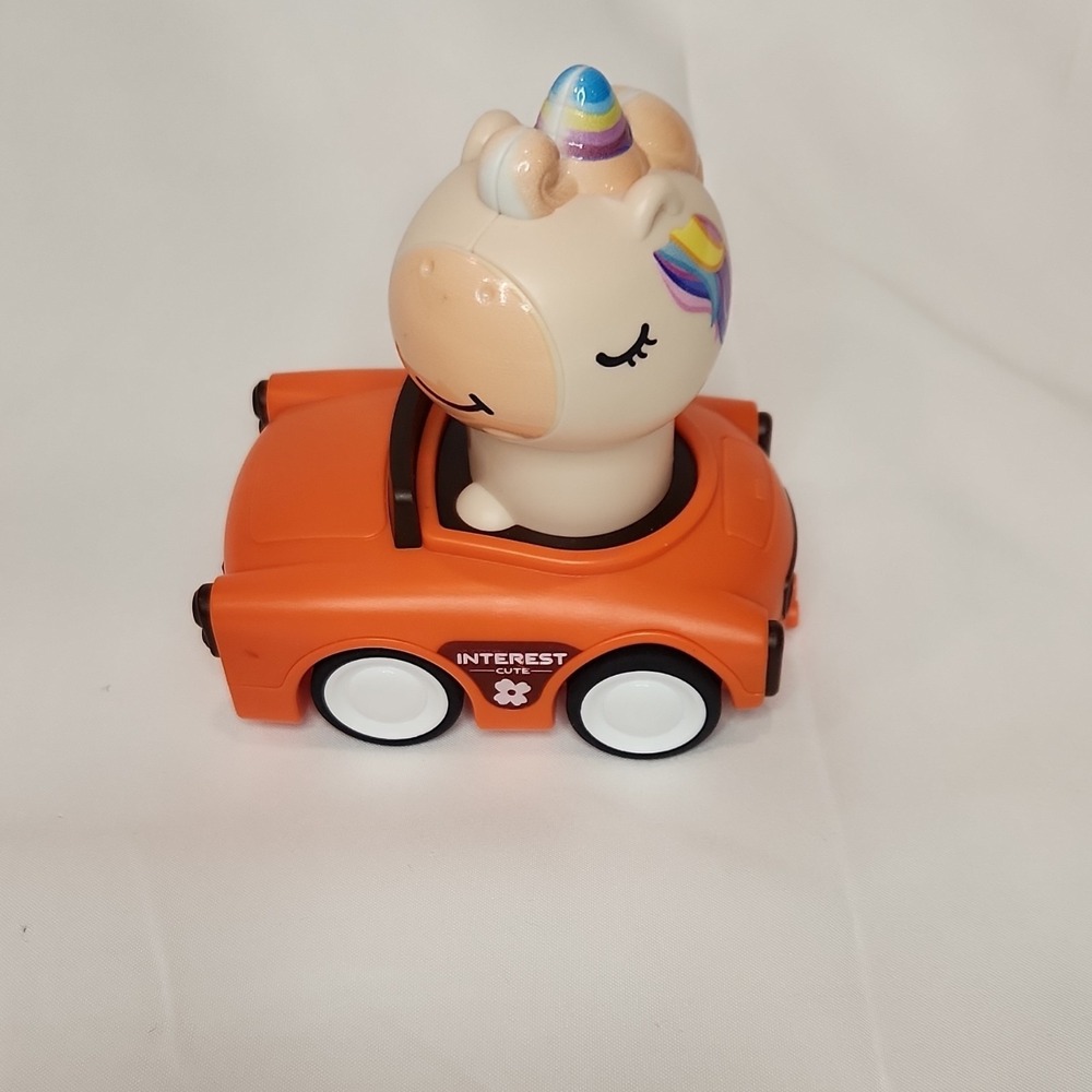 Interest Cute Unicorn in Orange Convertible Car Toy Rainbow Horn Figure